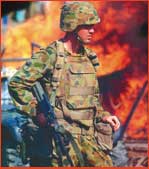 3RAR Digger on burning Dili docks