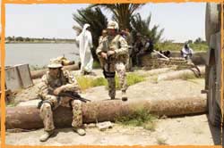 OBG-W Diggers patrol along the Euphrates River Dhi Qar Iraq 2006