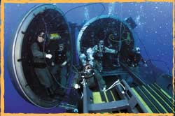 US Navy SEAL deploy an SDV minisub from an SSN submarine