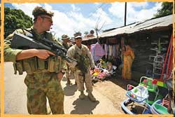 3RAR TLBG4 Para's patrol Baucau Market with US Marines April 2008