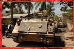 TLBG 6 M-113A1 conduct their final patrol through Dili