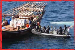 HMAS Parramatta Boarding Parties check on a dhow in the southern Arabian Gulf.