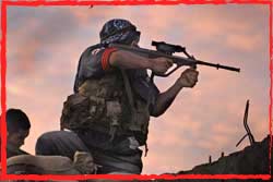 An F-88A1 armed F-FDTL grunt fires during a live training ex with Aussie Diggers in Timor.