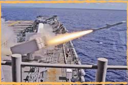 USS Bonhomme Richard fires a RIM-7 Sea Sparrow SAM.