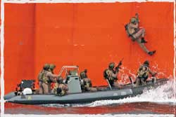 RAN Clearance Divers conduct a Ship Underway Recovery on the CPO China to rescue the crew from Somali Pirates.