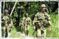 Anode 25 Diggers patrol near Guadalcanal, Solomon Islands.